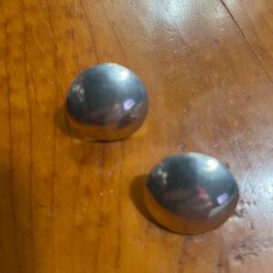 Classic Silver Dome Clip-On Earrings. Smooth polished finish.